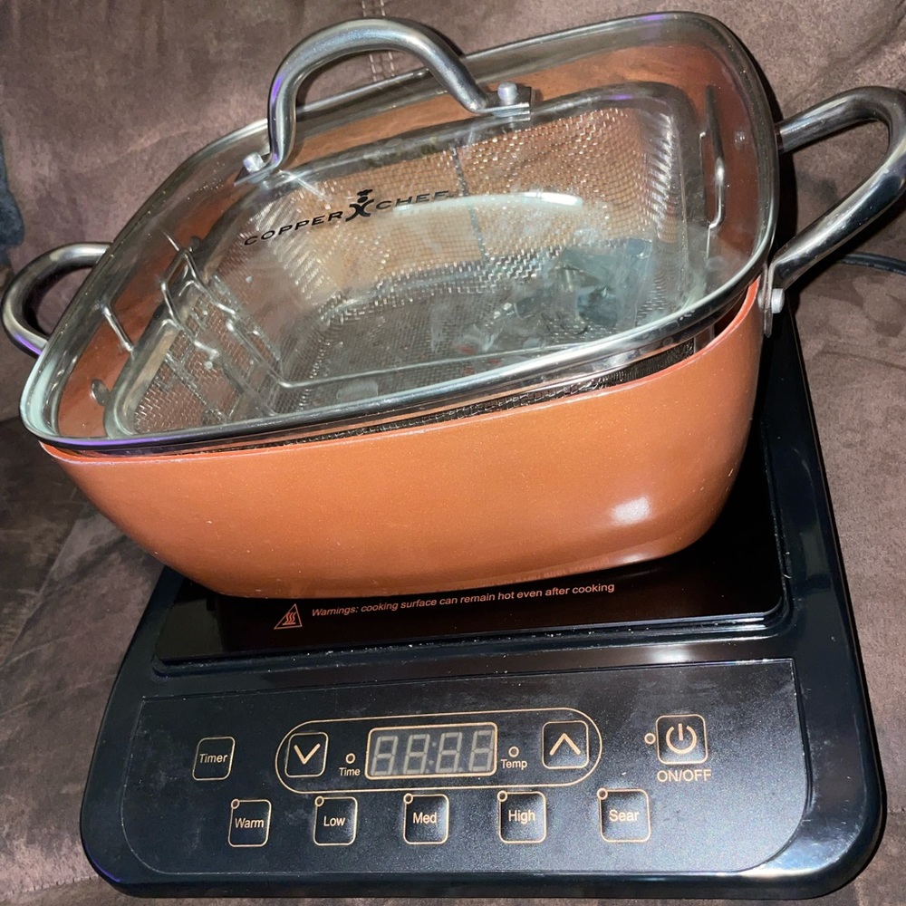 Copper chef induction stove and two cooking pots.  One 11" and the other 4.5 qt.